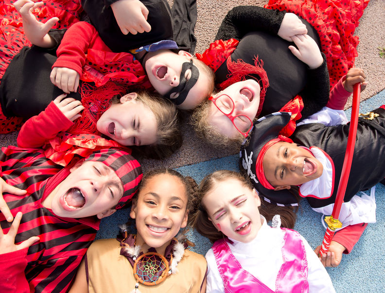 58753528 – group of kids on halloween posing outside 6500 in Savings